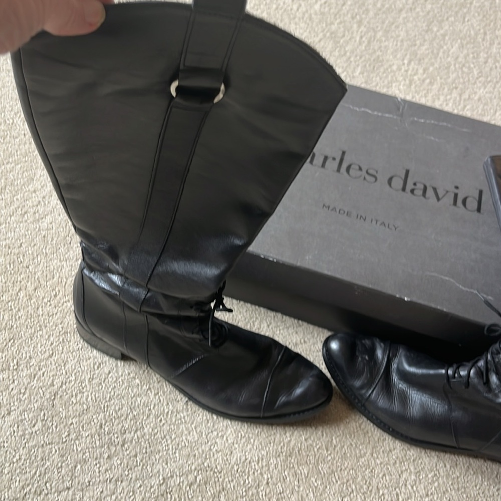 Charles David tall, black leather boots with lace up at angle. Side zip.